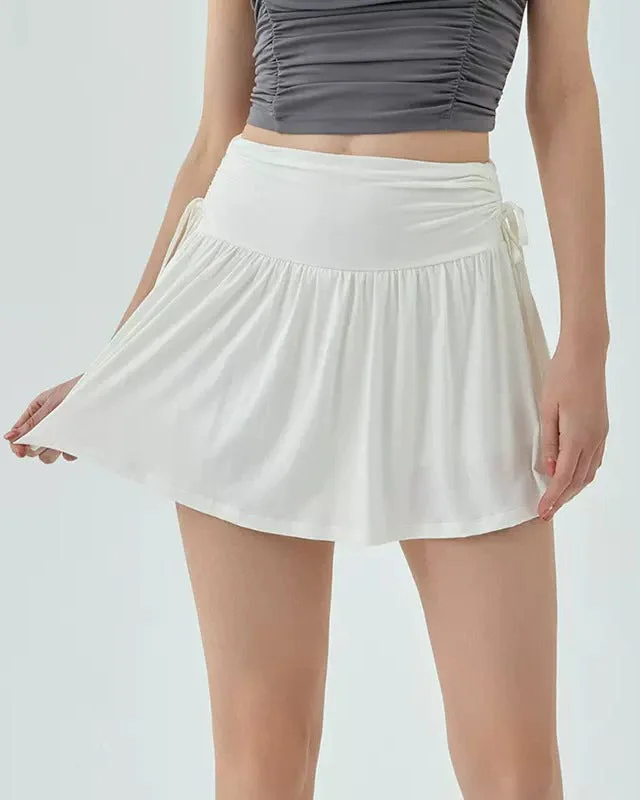 French Sun Tennis Skirt in White Button-front unclassified skirts